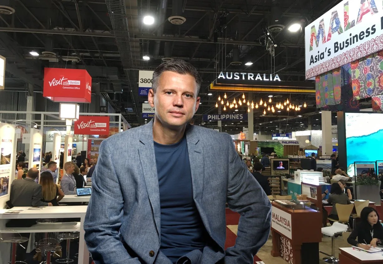 Maksim Godovykh at an international business event